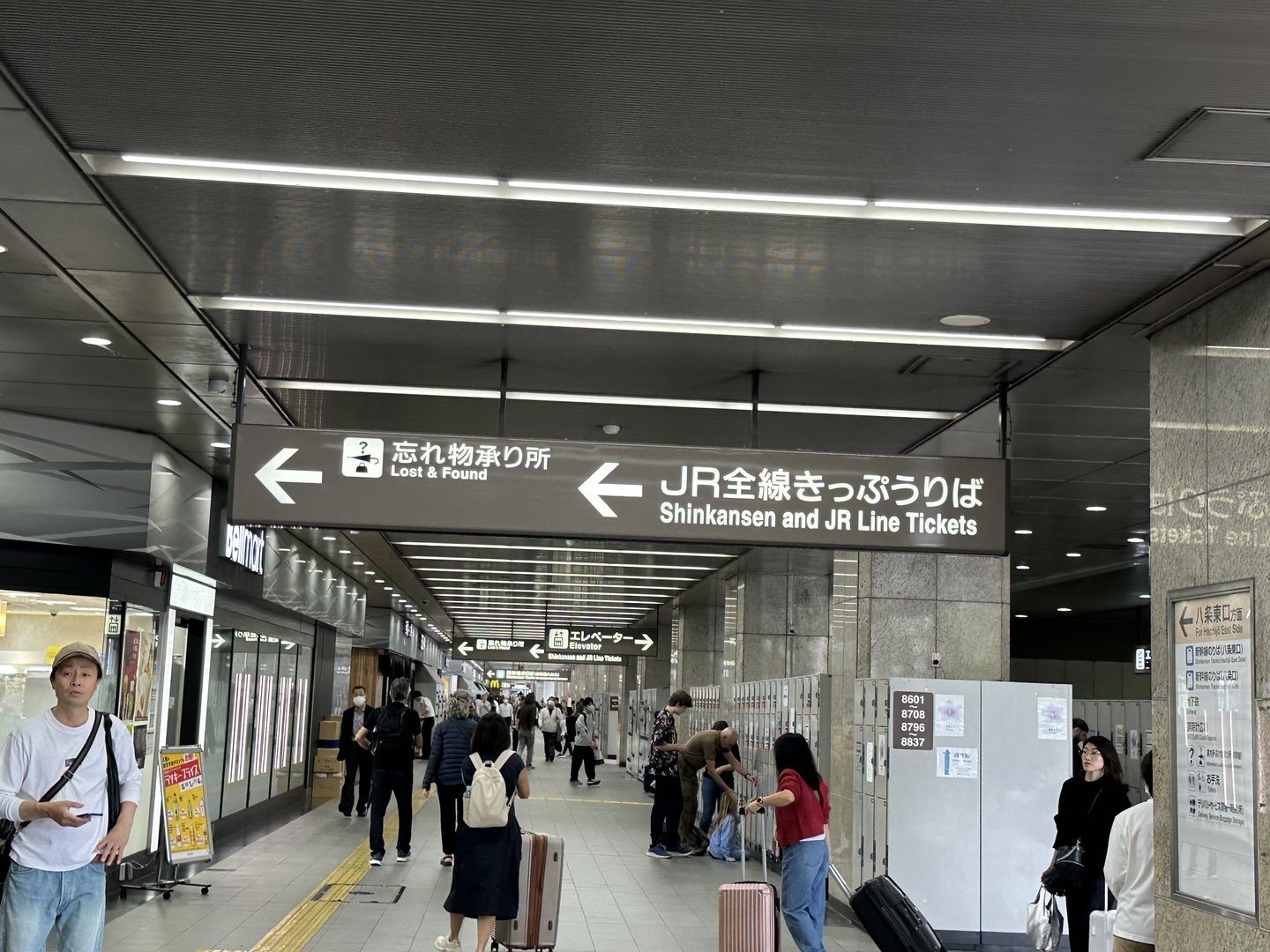 navigating kyoto station's underground maze to find our shinkansen tickets. christina's already memorized the japanese signs but i'm still lost without the english translations