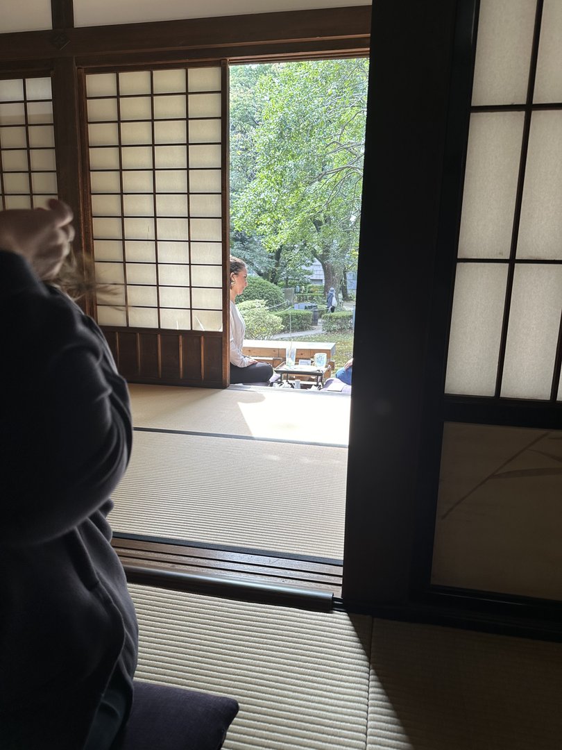 christina enjoying a traditional tea ceremony in a PEACEFUL tatami room at a temple in taito. dan's trying not to sneeze from all the incense.