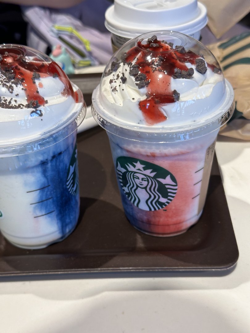 quick starbucks break near shibuya crossing with some WILD japan-exclusive frappuccinos - these blue and pink drinks are way cooler than anything we get back home