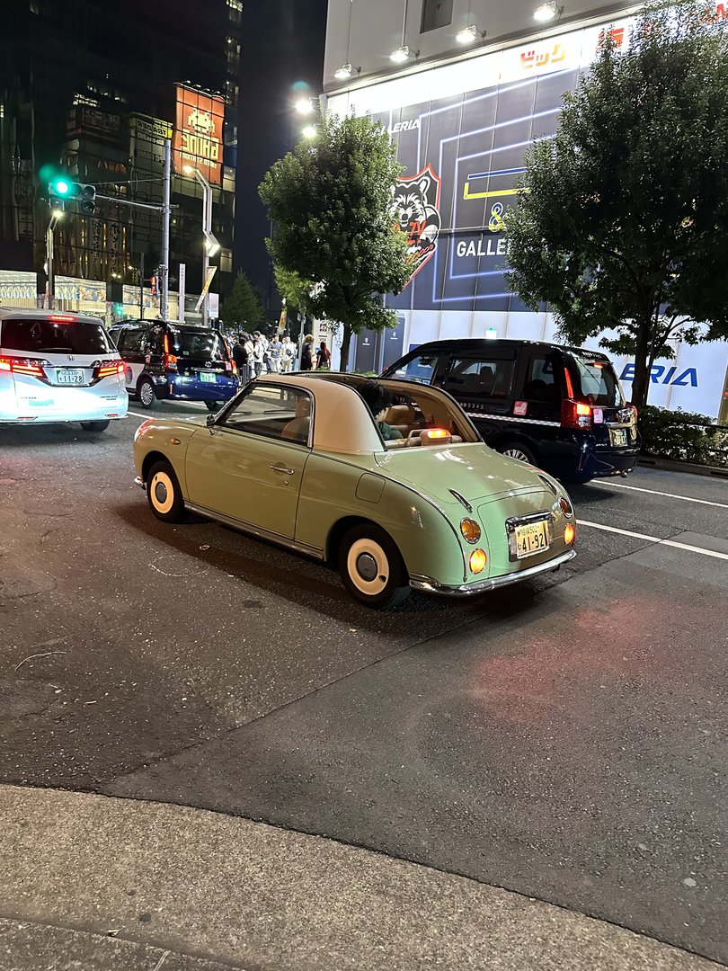 spotted this MINT nissan figaro while wandering around akihabara at night - these retro cars are way cooler in person than in photos