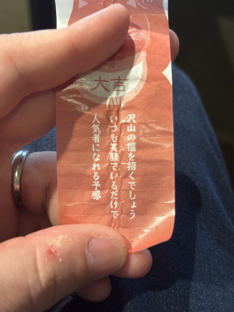 dan's fortune from the temple near nishiki market - these PINK paper fortunes are way cooler than the ones back home