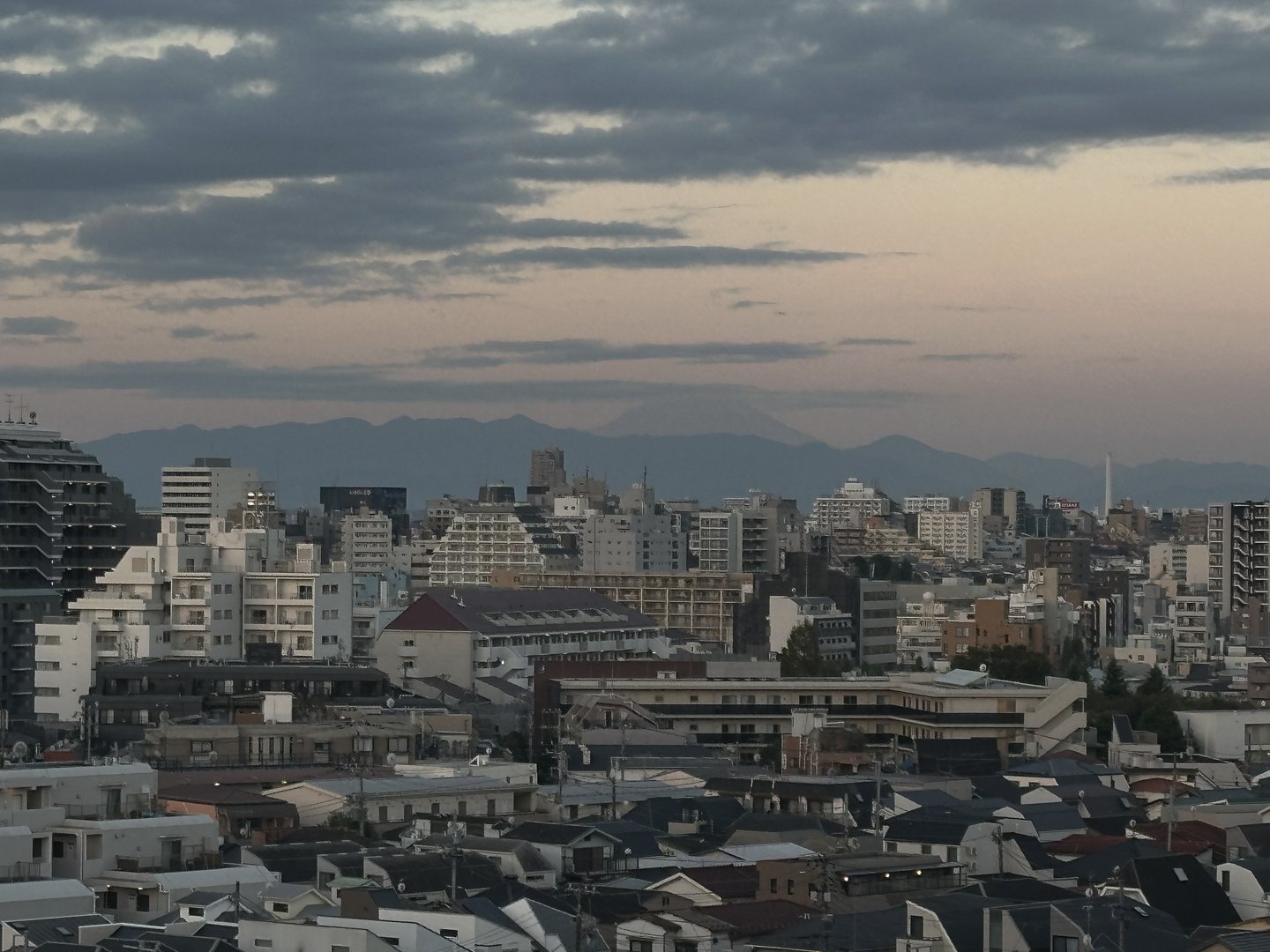 early morning view from our shinjuku airbnb - those mountains in the distance are the REAL reason i set my alarm for sunrise