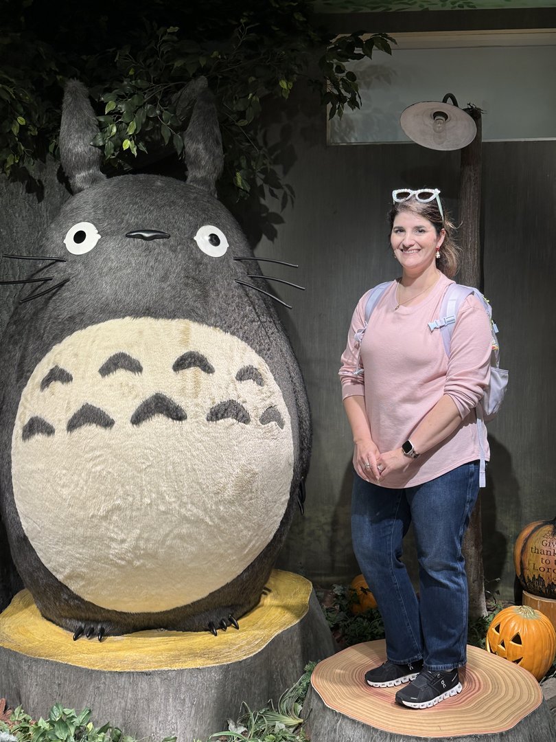 christina posing with the MASSIVE totoro statue at the tokyo skytree, because you can't visit japan without meeting this fuzzy forest spirit