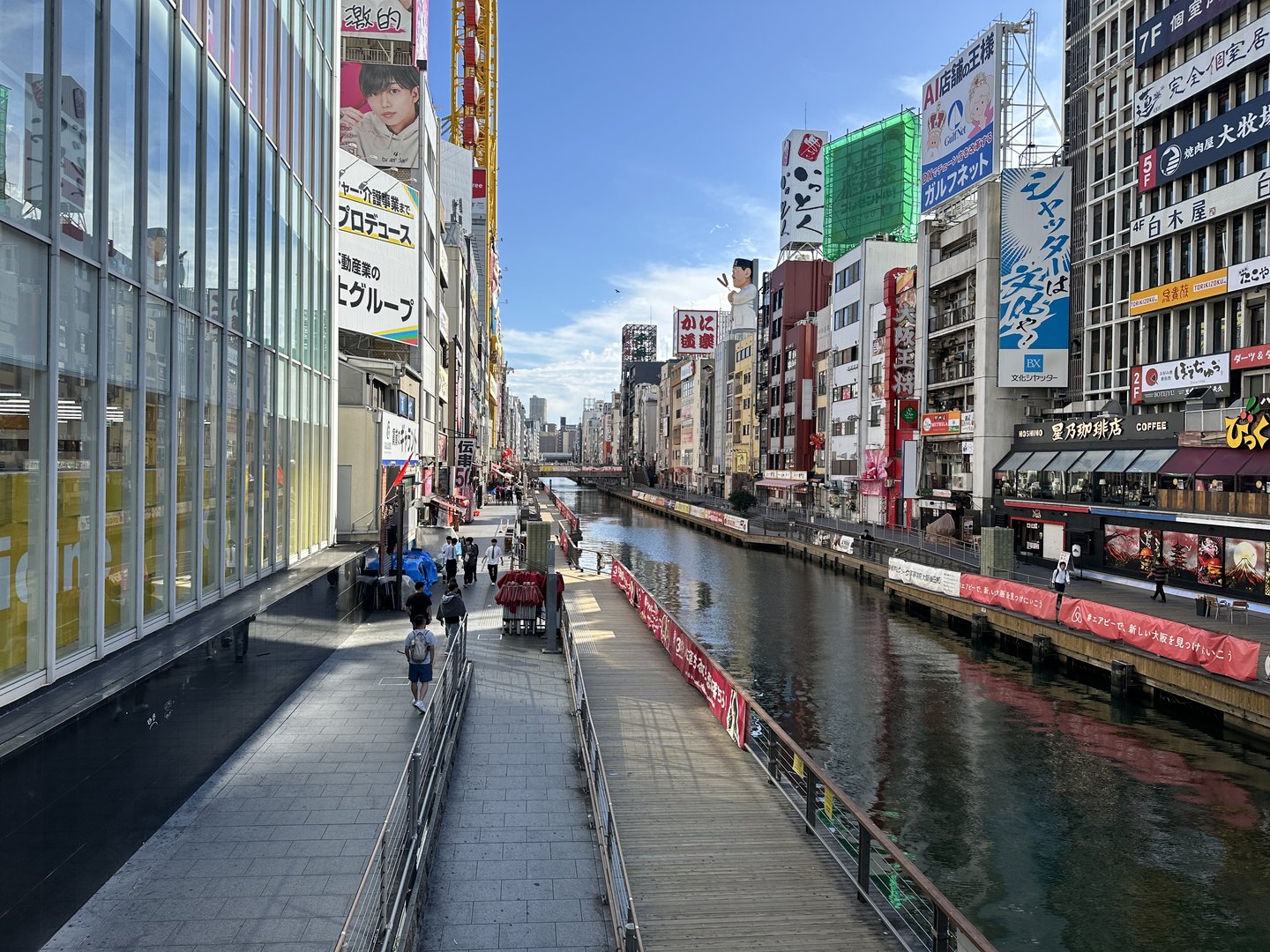 morning walk along the dotonbori canal - this spot in osaka is WILD at night but has a totally different vibe before the crowds show up