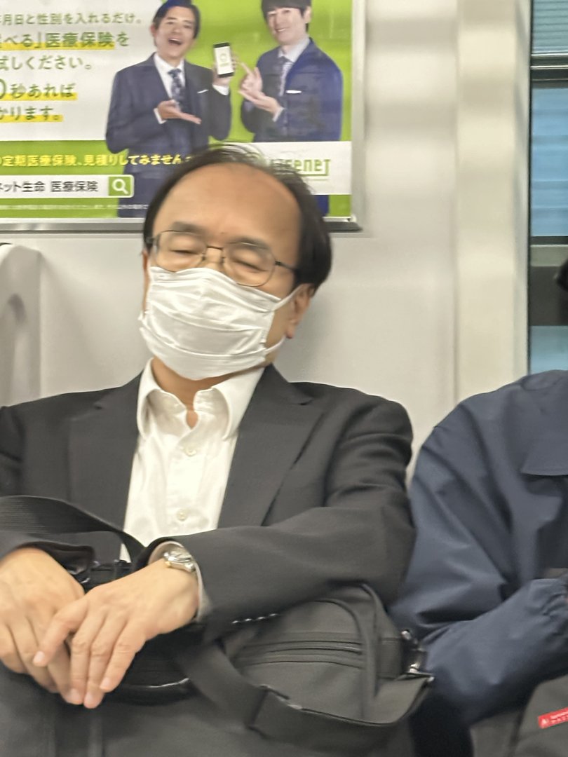 caught this classic sight on the shinjuku subway line - the infamous japanese salaryman power nap in action