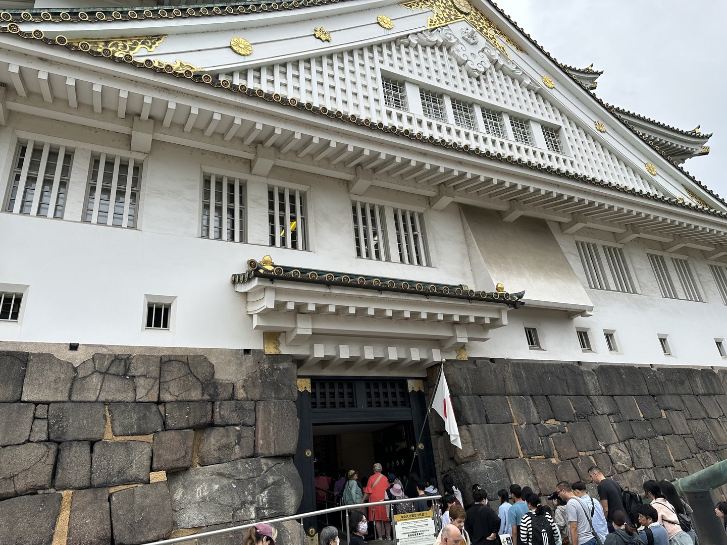 early morning line to get into osaka castle - worth getting here before the crowds get REALLY nuts