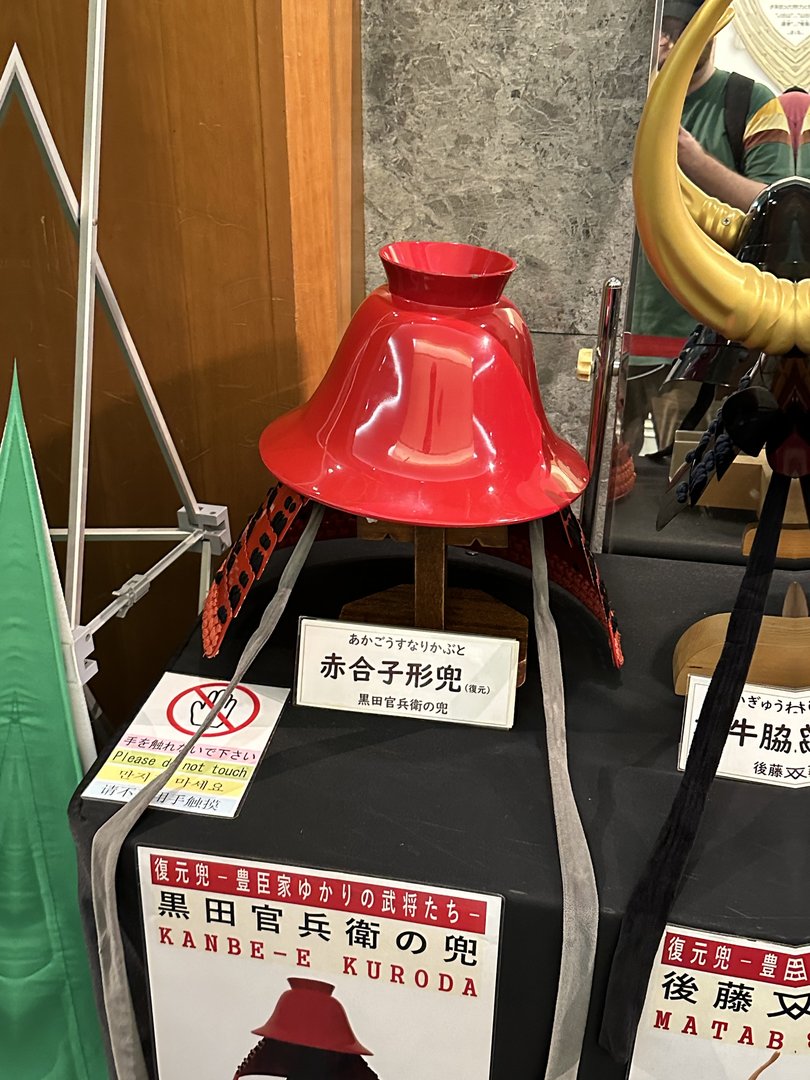 checking out some old-school samurai helmets at the osaka castle museum - dan's getting WAY into the history here