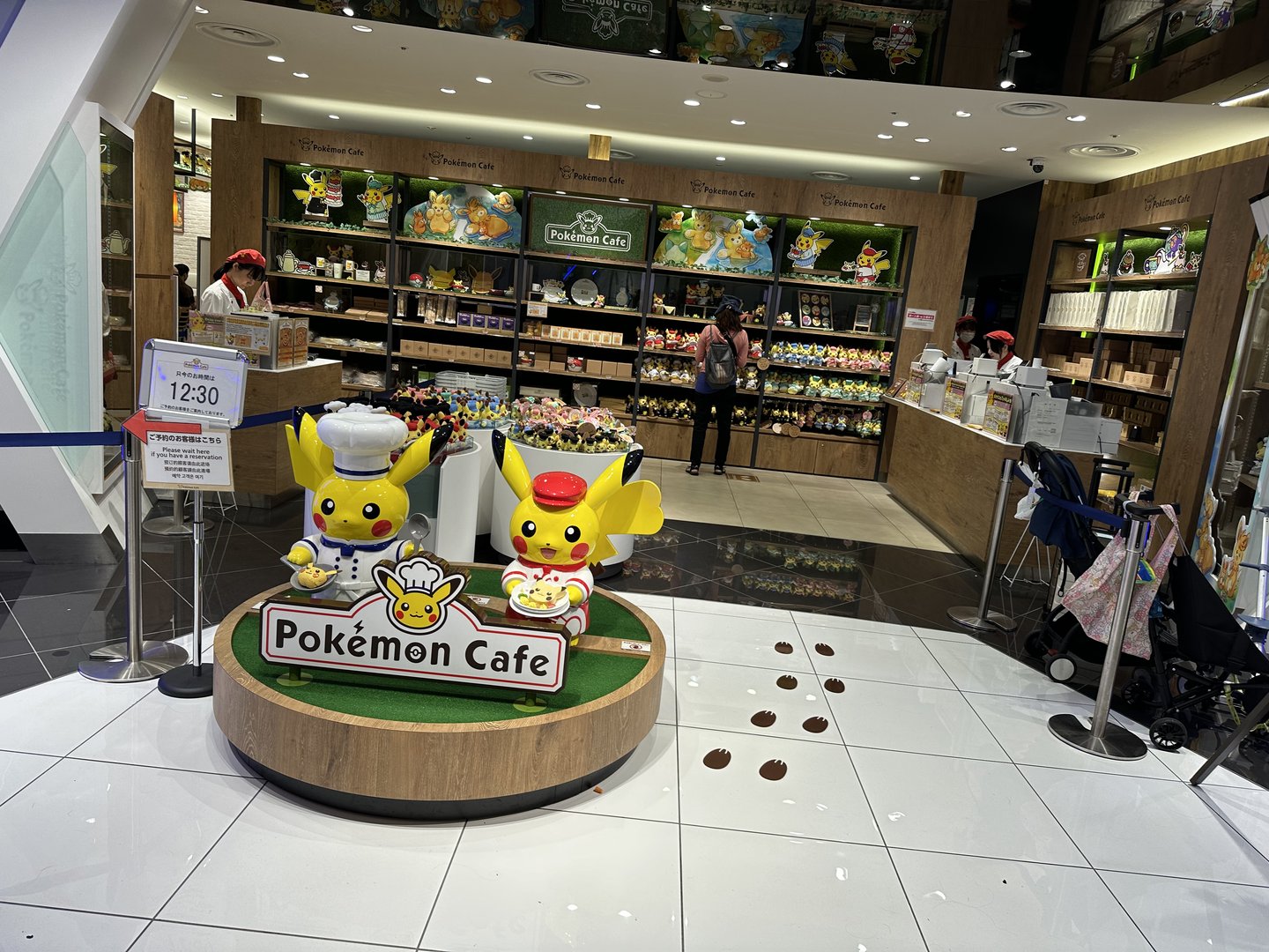 christina dragged dan to the pokemon cafe in osaka's dotonbori district. turns out he was just as into it as she was