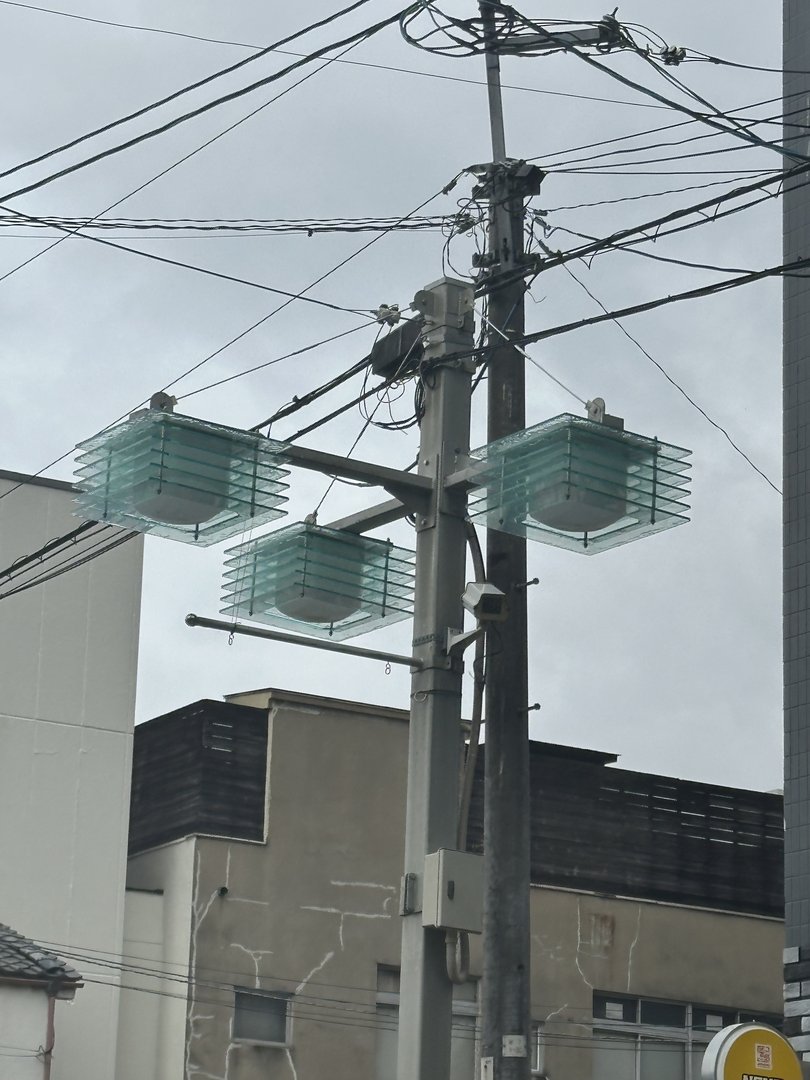 these distinctive glass street lamps caught my eye while walking through kyoto - way cooler than the boring ones back home