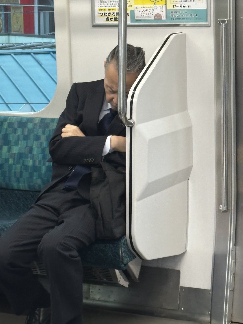 spotted this classic tokyo scene on the subway near shinjuku - the infamous japanese "inemuri" (sleeping while present) in action