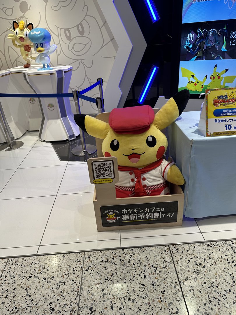 checking out the pokemon cafe in osaka's dotonbori district. dan's inner 90s kid is LIVING for this pikachu display