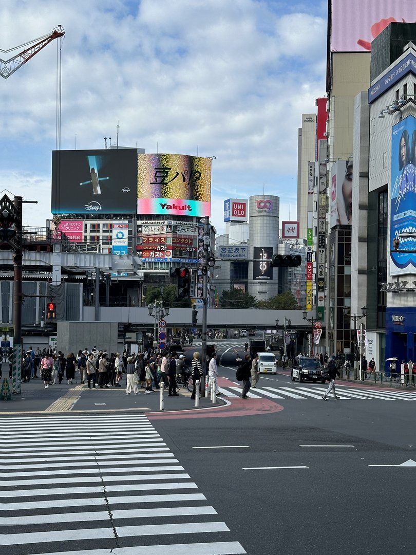 morning chaos at the famous shibuya crossing - those massive billboards are WILD compared to times square