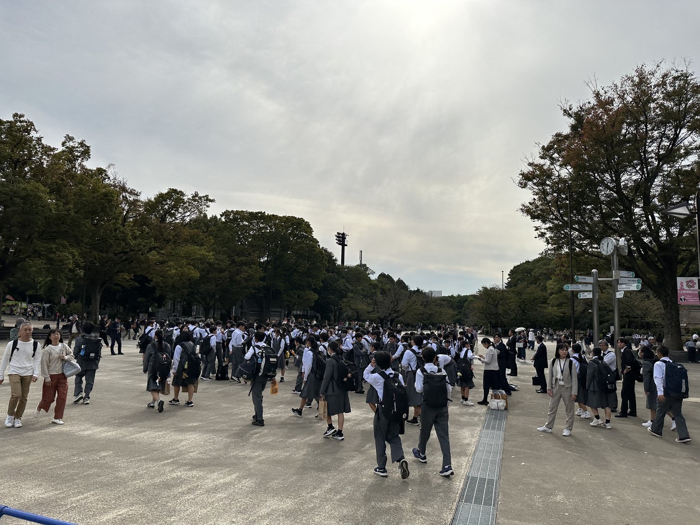 stumbled onto what looks like a MASSIVE school field trip while exploring ueno park. these matching uniforms are no joke